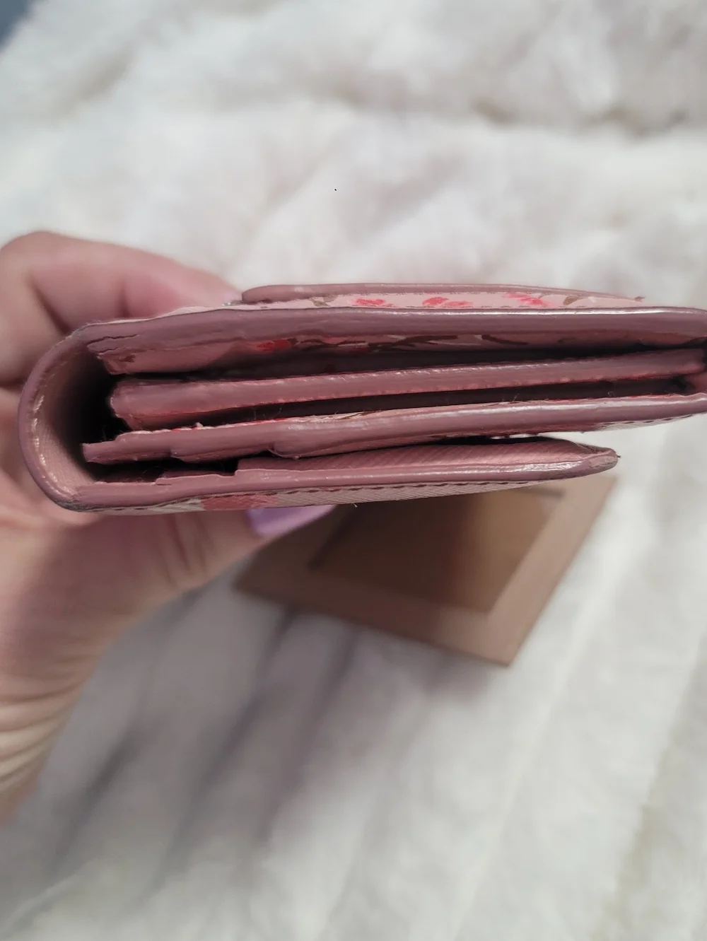 Prada Floral Continental Wallet made from pink Saffiano leather